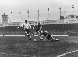 Allan Brown is thwarted by Newcastle keeper Bryan Harvey