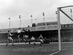 Gordon Turner sends a header over