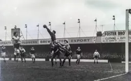 Fulham goalkeeper Ken Hewkins under pressure
