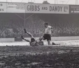 Mike Tracey goes in through the slush