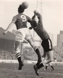 Alan Collier tangles with Chelsea's Ron Tindall