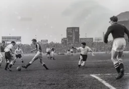 Mike Tracey attempts to win the ball