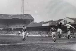 Joe McBride challenges for the ball