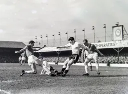Joe McBride contests a loose ball