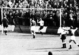 Seamus Dunne handles the ball in the area in the opening seconds