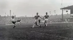 Les Spencer smacks the ball home for the Town's first goal