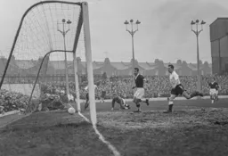 Allan Brown watches as Gordon Turner's shot squeezes home for the first goal