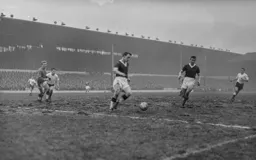 The ball about to be cleared upfield