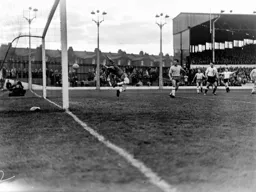 The ball flies in from the boot of Alec Ashworth