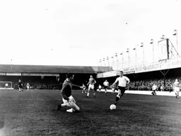 Alec Ashworth in a chase for the ball