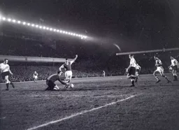 Ron Baynham about to drop on the ball