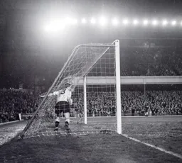 Brendan McNally takes the ball out of the back of the net