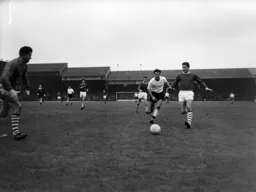Tommy McKechnie closes down the Swans defender