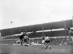 John Groves challenges for the ball