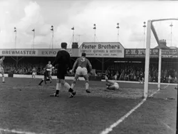 Liverpool keeper Jim Furnell drops on the ball