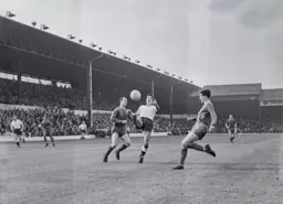 Gordon Turner about to be tackled by Norman Hunter