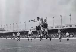 Tommy McKechnie leaps for the ball