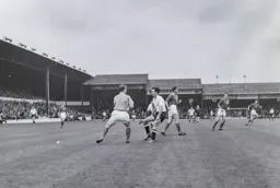 Tommy McKechnie challenges the goalkeeper