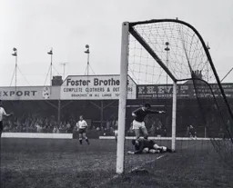 Ron Baynham smothers the ball