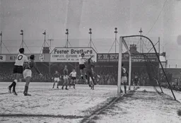 Ron Davies heads over