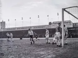 Huddersfield's John Coddington has just put through his own net