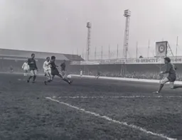 Mike Fairchild is beaten to the ball