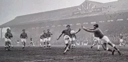 John O'Rourke just fails to get to the ball