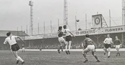 Dave Pacey wins this header