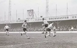 Colchester keeper Percy Ames is bumped by Tommy McKechnie