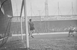 Future Hatter Ron Swan safely gathers the ball