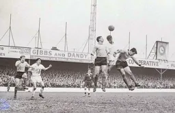 John O'Rourke gets in between two Watford defenders