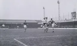 David Pleat and Dave Pacey get in each others way going in for a header