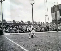 David Pleat wriggles his way past Len Ashurst