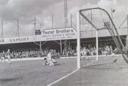 Tommy McKechnie heads in the Town's third goal