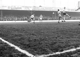 John Reid misses the ball but Graham French lays in wait