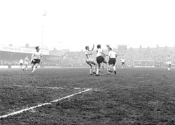 John O`Rourke and Tommy McKechnie try to bring the ball under control