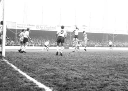 The United defence deal with this attack as Tommy McKechnie and John O`Rourke wait in the goalmouth