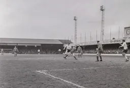 Richard Edwards and Roger Holmes compete for the ball