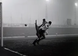 The ball flies across the Rovers goal mouth