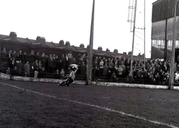 Graham French is tackled by Bobby Ross