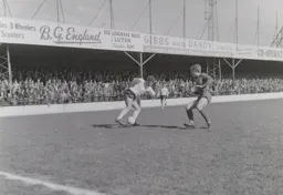 Gerry King takes on the defender as Graham French comes up in support