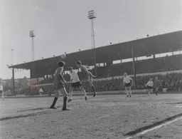 Gerry King cannot prevent the ball from being cleared