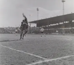 Gerry King looks on from a distance as United keeper Les Green catches the ball