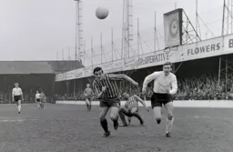 Fred Jardine in a race for the ball with Jimmy Grummett