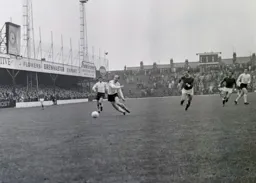 Ian Buxton runs forward with the ball