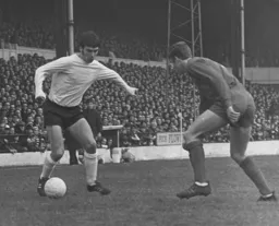 John Ryan attempts to get a cross in