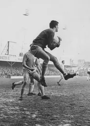 The Wrexham goalkeeper Gordon Livsey gathers the ball