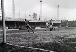 Keith Allen watches the ball heading towards the goal but City keeper John Kennedy makes the save