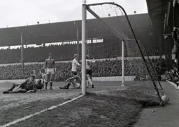 The visitors defence is disconsolate as Keith Allen and Ian Buxton celebrate Buxton`s goal