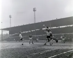John Moore up with the attack but is thwarted as Stuart Sharratt gets to the ball
